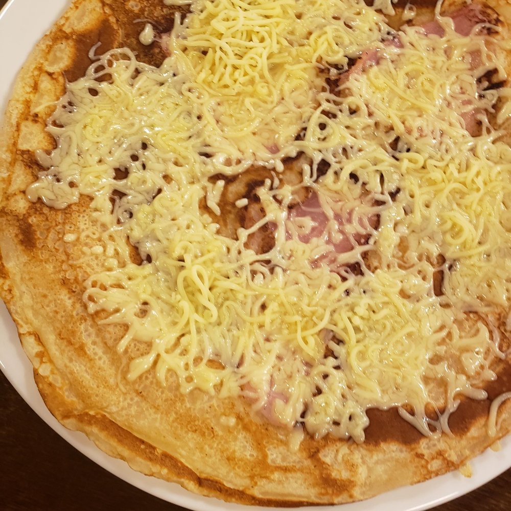 Dutch pancake with ham and cheese.