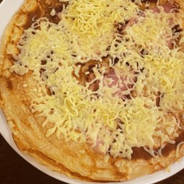 Dutch pancake with ham and cheese.