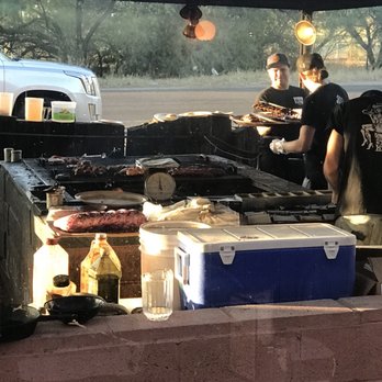 Daisy Mae's Steakhouse - Working hard on the grill out front. Following the smoke - Steakhouses Near Me - Tucson, Arizona Daisy Mae's Steakhouse - Working hard on the grill out front. Following the smoke - Steakhouses Near Me - Tucson, Arizona