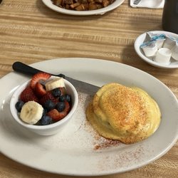 Old Mill Cafe - Half order of eggs Benedict with dress fruit