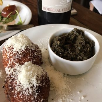 Coltivare - The always perfect Arancini. A bottle of wine and these make any day perfect. - Italian Near Me - Houston, Texas Coltivare - The always perfect Arancini. A bottle of wine and these make any day perfect. - Italian Near Me - Houston, Texas