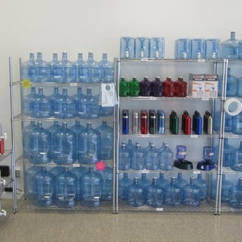 H2O To Go - Water Store - a shelf full of water bottles - Water Stores Near Me - Tracy, California