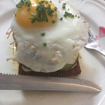 Sacred Beast - their single cheeseburger topped with egg and a hashbrown pattie as the bun underneath! - Bars Near Me - Cincinnati, Ohio Sacred Beast - their single cheeseburger topped with egg and a hashbrown pattie as the bun underneath! - Bars Near Me - Cincinnati, Ohio