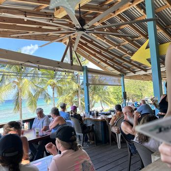 The Landing Beach Bar - View of beach from dining area - New American Near Me - Christiansted, Virgin Islands The Landing Beach Bar - View of beach from dining area - New American Near Me - Christiansted, Virgin Islands