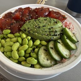 Poke bowl with added avocado and edamame.
