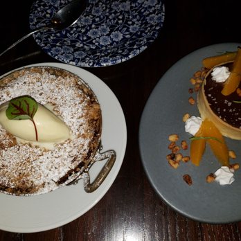 La Bodega - Dark chocolate tart -not too sweet,  just great  Banana rum dessert-hot with cold ice cream,  so filling and delicious - Spanish Near Me - Watertown, Massachusetts