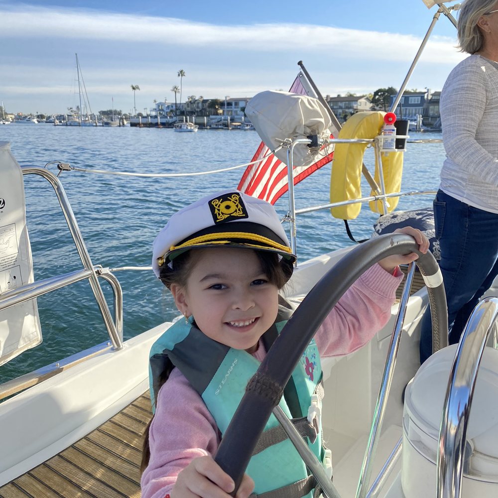 Captain Frank's Sailing Adventures - Captain Bree assisting Captain Frank - Boat Charters Near Me Captain Frank's Sailing Adventures - Captain Bree assisting Captain Frank - Boat Charters Near Me