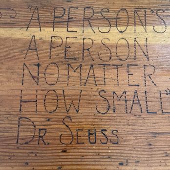The Rusty Goat - Quotes on the wooden table. - Beer Bar Near Me - Tacoma, Washington The Rusty Goat - Quotes on the wooden table. - Beer Bar Near Me - Tacoma, Washington