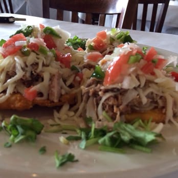 Malanga Cuban Cafe - Nacho Cubano!!! Meat is layered on a bed of tostones! - Cuban Near Me - Pinecrest, Florida Malanga Cuban Cafe - Nacho Cubano!!! Meat is layered on a bed of tostones! - Cuban Near Me - Pinecrest, Florida