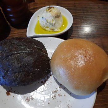 Jimmy P's Charred - Pumpernickel and white roll with Cherry herb butter and olive oil. So delicious! - Steakhouses Near Me - Naples, Florida Jimmy P's Charred - Pumpernickel and white roll with Cherry herb butter and olive oil. So delicious! - Steakhouses Near Me - Naples, Florida