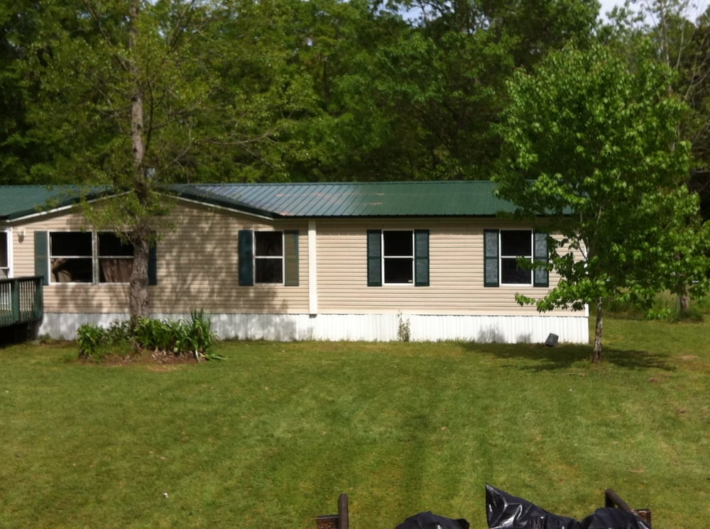 Slide of Shields Metal Roofing
