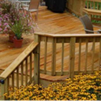 Paul Fike Builders - wooden deck with flowers - General Contractors Near Me Paul Fike Builders - wooden deck with flowers - General Contractors Near Me