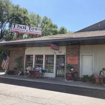 Thai Town - Outside, you can see two small tables outside - Thai Near Me - South Elgin, Illinois Thai Town - Outside, you can see two small tables outside - Thai Near Me - South Elgin, Illinois