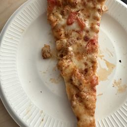 Butter chicken slice. They are now stingy with the toppings. Butter chicken slice. They are now stingy with the toppings.