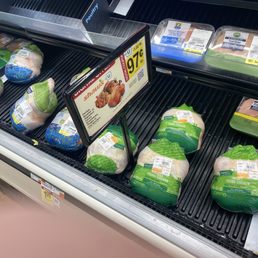 The chicken around the sign isn't part of the promotional. It is in fact $1.02 per pound more.