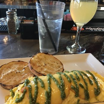 South Hill Grill - Seattle omelet! Prosciutto, smoked Gouda, tomato--drizzled with pesto. Can't be beat! - New American Near Me - Spokane, Washington South Hill Grill - Seattle omelet! Prosciutto, smoked Gouda, tomato--drizzled with pesto. Can't be beat! - New American Near Me - Spokane, Washington