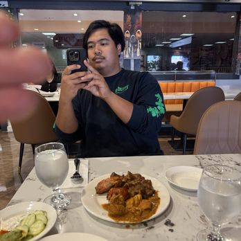 India Palace - Austin with side of chicken and goat curry - Indian Near Me - Norwalk, California India Palace - Austin with side of chicken and goat curry - Indian Near Me - Norwalk, California