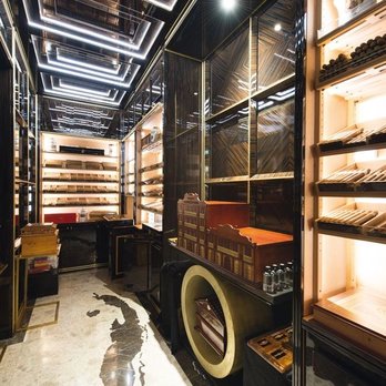 Puffz N’ Pearlz - a display case with a variety of baked goods - Cigar Bars Near Me - Carrollton, Texas Puffz N’ Pearlz - a display case with a variety of baked goods - Cigar Bars Near Me - Carrollton, Texas