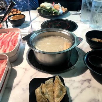 Boiling World - Tonkatsu soup base and Dumplings for appetizers. - Hot Pot Near Me - Ontario, California