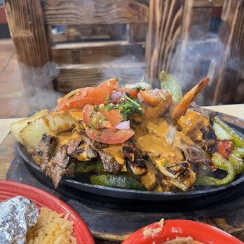 Salsa & Beer - Beef and shrimp flaming hot fajitas - Mexican Near Me - Van Nuys, California Salsa & Beer - Beef and shrimp flaming hot fajitas - Mexican Near Me - Van Nuys, California