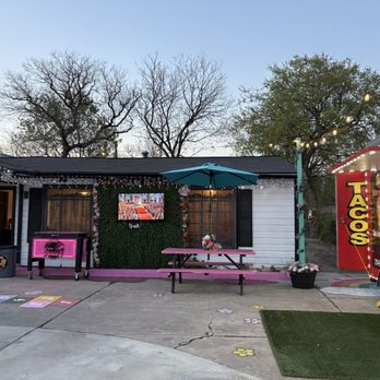 Los Famosos Tacos - Outdoor seating with TV. - Mexican Near Me - San Antonio, Texas