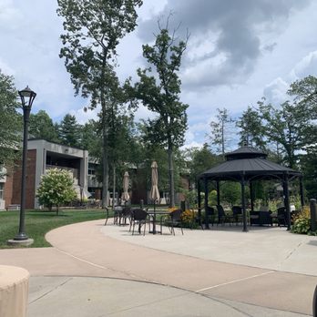 McLean - In for a visit.  The court yard is shady with a tepid breeze. - Retirement Homes Near Me - Simsbury, Connecticut