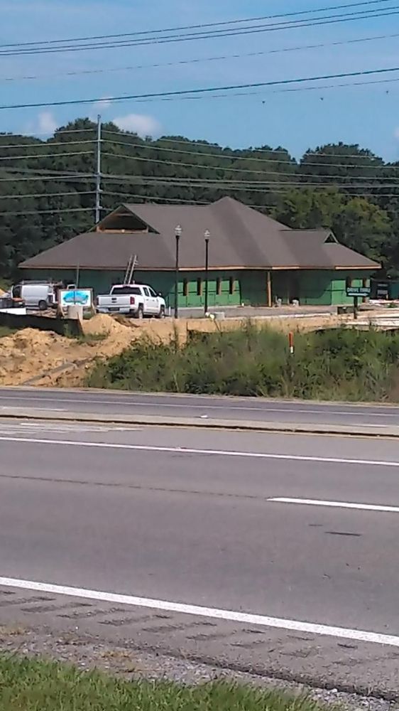 Slide of Curvin’s Roofing