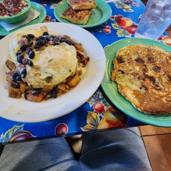 The Flying Biscuit Cafe - Chorizo hash with over medium egg, oatmeal pancake, grilled mac n cheese, side of grits - Breakfast & Brunch Near Me - Peachtree Corners, Georgia The Flying Biscuit Cafe - Chorizo hash with over medium egg, oatmeal pancake, grilled mac n cheese, side of grits - Breakfast & Brunch Near Me - Peachtree Corners, Georgia