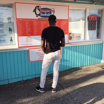 Penguin's SnoBalls - Hubby looking at the menu - Desserts Near Me - Norfolk, Virginia