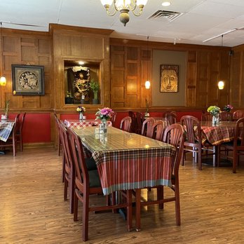 Racha Thai Cuisine - tables and chairs in a restaurant - Thai Near Me - Chesapeake, Virginia Racha Thai Cuisine - tables and chairs in a restaurant - Thai Near Me - Chesapeake, Virginia