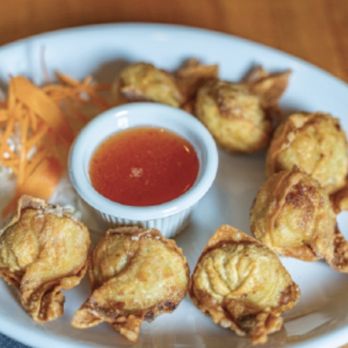 Basil Thai Cuisine - FRIED WONTONS Chicken, shrimp, and cream cheese, wonton wrapper. Served with Chef Suntorn's sauce - Thai Near Me - Charlotte, North Carolina
