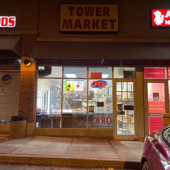 Tower Market - a car parked in front of the store - Grocery Near Me - Richmond Hill, Ontario Tower Market - a car parked in front of the store - Grocery Near Me - Richmond Hill, Ontario