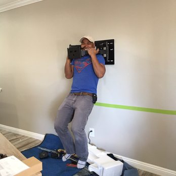 Comm Plus Computer & Home Theater Services - Chab Hanging on the tv mount - no need to worry about TV being stable - Home Theatre Installation Near Me Comm Plus Computer & Home Theater Services - Chab Hanging on the tv mount - no need to worry about TV being stable - Home Theatre Installation Near Me
