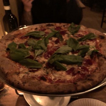 Lucali - A large pie with basil (included), portabello mushrooms, pepperoni, and shallots. - Pizza Near Me - Brooklyn, New York Lucali - A large pie with basil (included), portabello mushrooms, pepperoni, and shallots. - Pizza Near Me - Brooklyn, New York