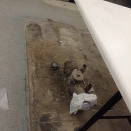 Torn up floors with exposed pipes Torn up floors with exposed pipes