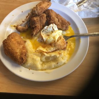 The Serving Spoon - Wings, grits and 2 eggs sunny side up...delish! - Breakfast & Brunch Near Me - Inglewood, California