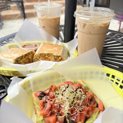 Breezeway Cafe - The 'original' breakfast burrito (+avocado) W/The lady Liberty & The 'Regular' Avocado toast W/ The specialty Tuxedo mocha