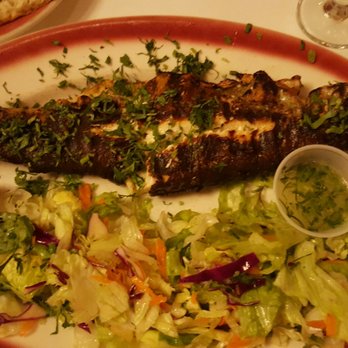 Taci's Beyti - Grilled trout. The skin was burnt, but the flesh was good. - Turkish Near Me - Brooklyn, New York Taci's Beyti - Grilled trout. The skin was burnt, but the flesh was good. - Turkish Near Me - Brooklyn, New York
