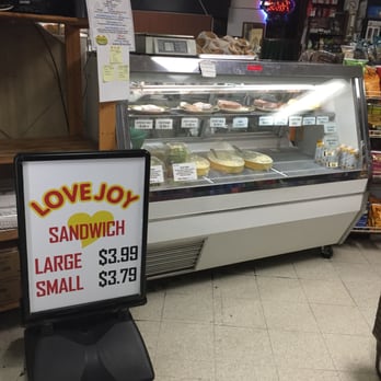 Lovejoy Market - a sign in front of a display case - Grocery Near Me - Portland, Oregon Lovejoy Market - a sign in front of a display case - Grocery Near Me - Portland, Oregon