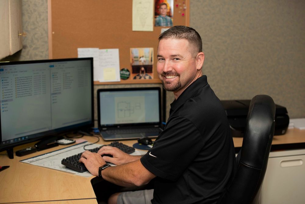 Slide of Tugwell Roofing