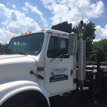Coffey & Son Tree Service - a white truck parked on the side of the road - Tree Services Near Me - Castle Shannon, Pennsylvania Coffey & Son Tree Service - a white truck parked on the side of the road - Tree Services Near Me - Castle Shannon, Pennsylvania