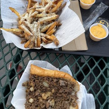 Philly's Phamous Cheesesteaks - Malik's Philly & parm herbed fries - Food Trucks Near Me - San Antonio, Texas Philly's Phamous Cheesesteaks - Malik's Philly & parm herbed fries - Food Trucks Near Me - San Antonio, Texas