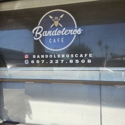 Exterior outside entrance of Bandoleros Cafe - Front window - Huntington Beach, California Exterior outside entrance of Bandoleros Cafe - Front window - Huntington Beach, California