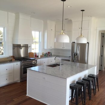 Norman Construction - a kitchen with a center island - General Contractors Near Me - Hattiesburg, Mississippi