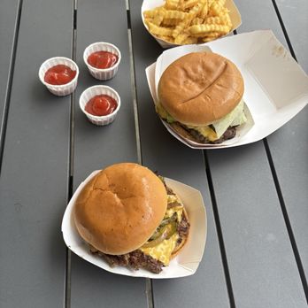 Parkside Pull-Up - Whop Burger (on the right) and Classic Cheeseburger with grilled onions and peppers (on the left). - Hot Dogs Near Me - Greensboro, North Carolina