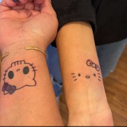 Hello kitty tattoos Hello kitty tattoos