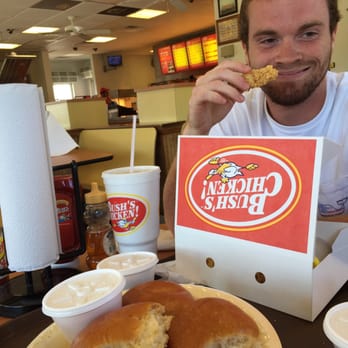 BUSH'S CHICKEN GATESVILLE - a man eating a sandwich - Chicken Wings Near Me - Gatesville, Texas BUSH'S CHICKEN GATESVILLE - a man eating a sandwich - Chicken Wings Near Me - Gatesville, Texas