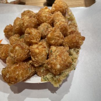 Fire Wings - LRG - TATER TOTS tossed in garlic Parmesan. - Chicken Shop Near Me - Irvine, California Fire Wings - LRG - TATER TOTS tossed in garlic Parmesan. - Chicken Shop Near Me - Irvine, California