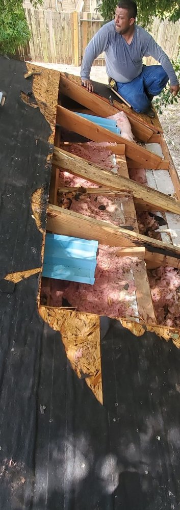 Slide of Truly Roofing & Construction