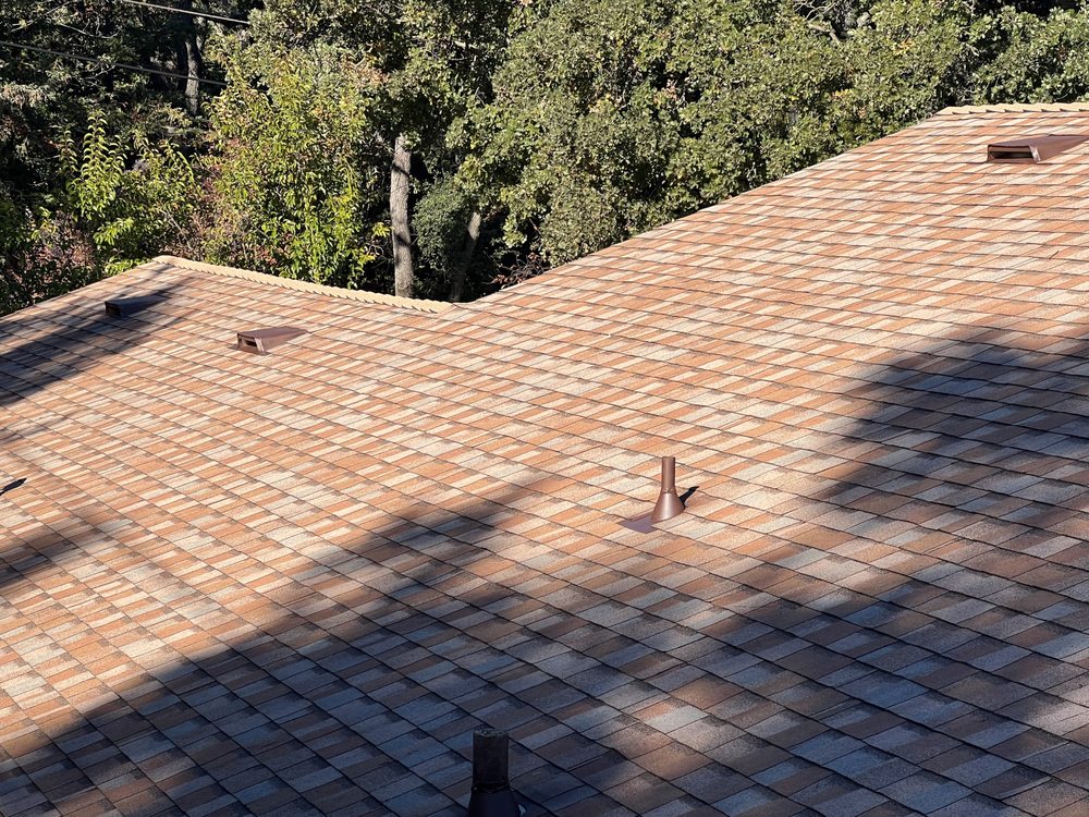 Slide of Everest Roofing